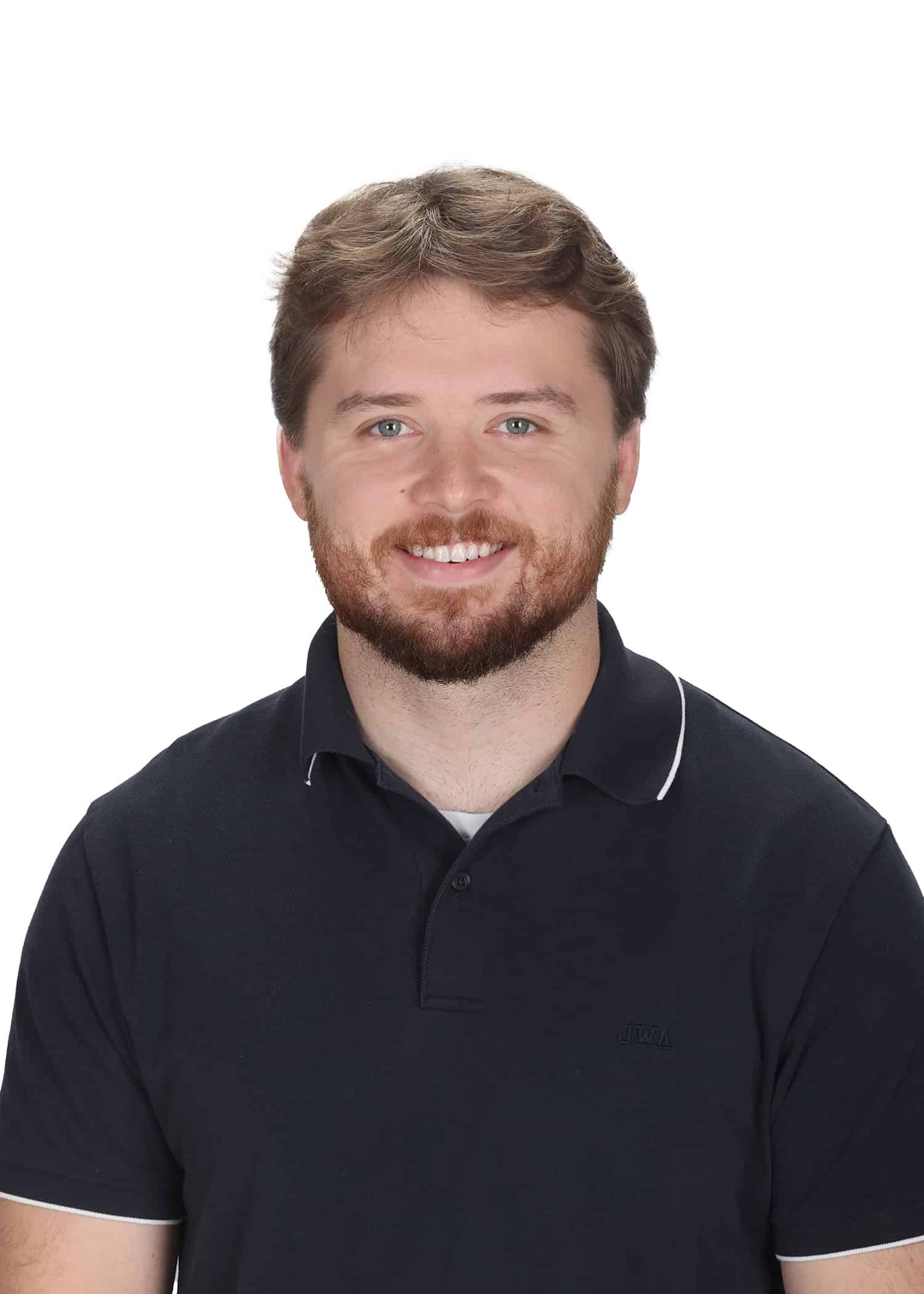 Portrait of Mark Palmieri, smiling man with beard at The Center for Children with Special Needs.